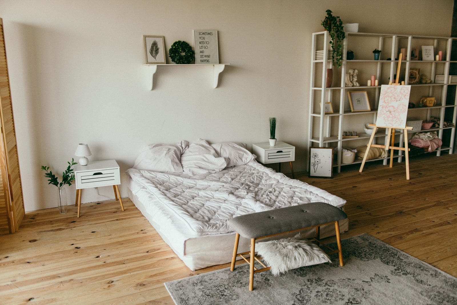 Cozy bedroom in a Scandinavian apartment — Copenhagen Airbnb bedrooms are typically smaller than hotels but more atmospheric with personal touches