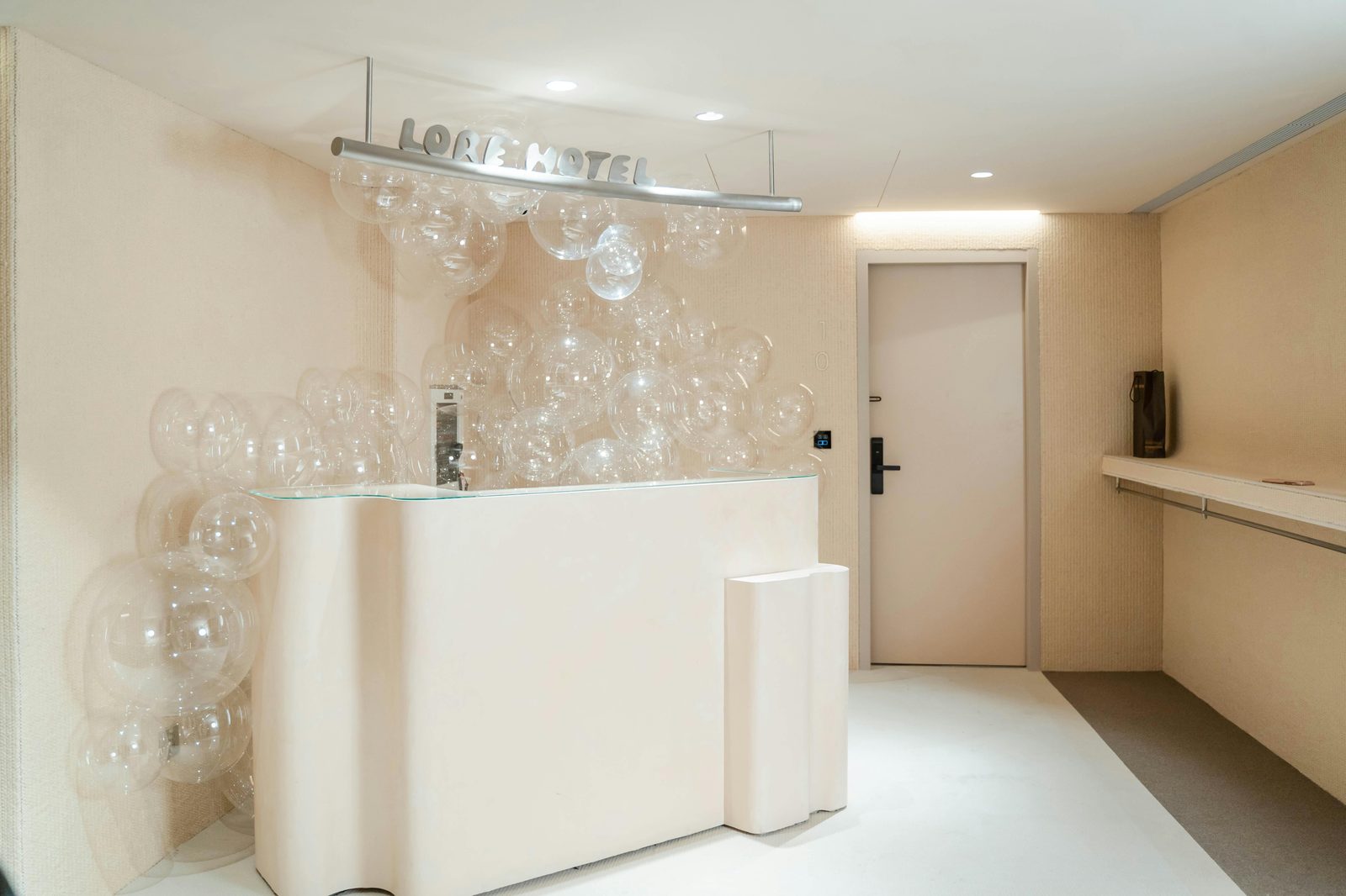 Modern hotel reception counter — Copenhagen budget hotels offer 24-hour reception, key-card entry and self-check-in kiosks at most chains