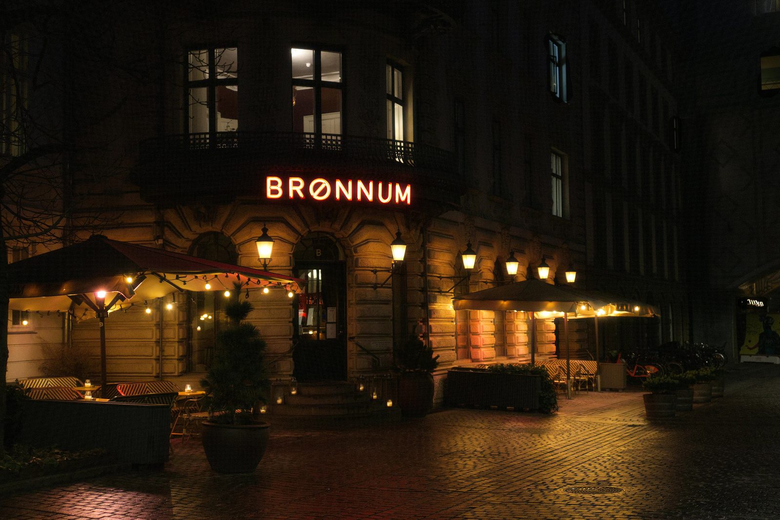 Warm, cozy café at night in Copenhagen showing the city's hygge atmosphere