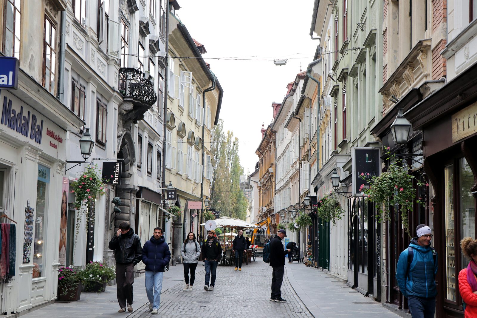 Pedestrian shopping street with historic buildings — similar to Copenhagen's Indre By and Strøget