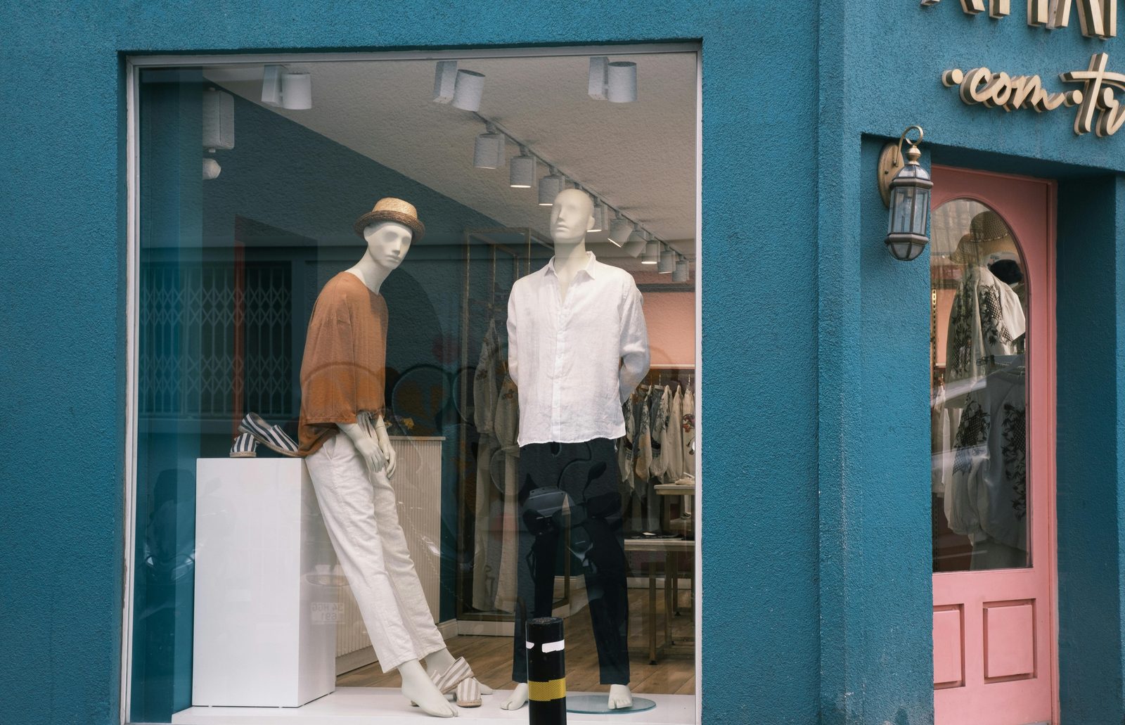 Mannequins showcasing stylish apparel in a boutique window — Copenhagen's neighborhood boutiques in Værnedamsvej and Nørrebro showcase Ganni, Stine Goya and Cecilie Bahnsen
