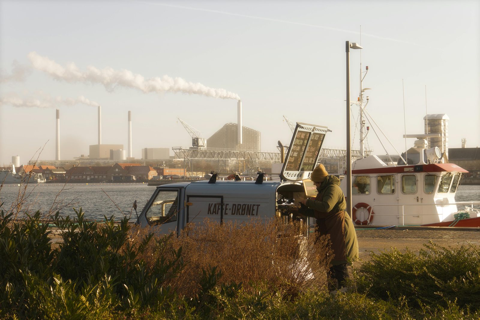 Coffee van and harbour in Copenhagen at sunset — Danish cafés and restaurants run on punctuality and quiet conversation