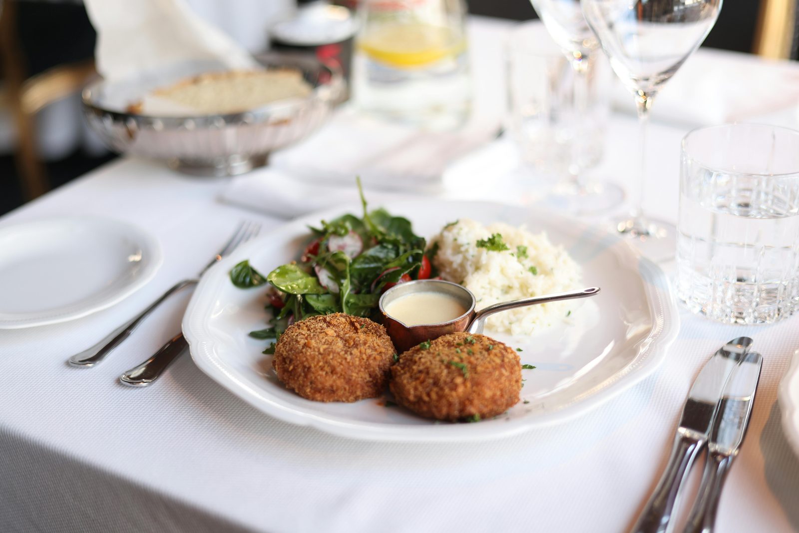Beautifully plated gourmet Scandinavian meal — Copenhagen restaurants fill up days in advance and booking is the single biggest food travel tip