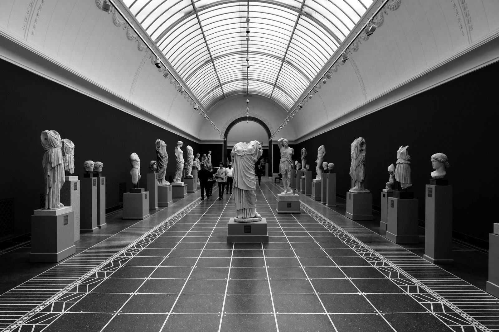 Captivating sculptures in a Copenhagen museum hallway — the Ny Carlsberg Glyptotek is Denmark's premier fine-art museum, founded in 1888 by brewer Carl Jacobsen