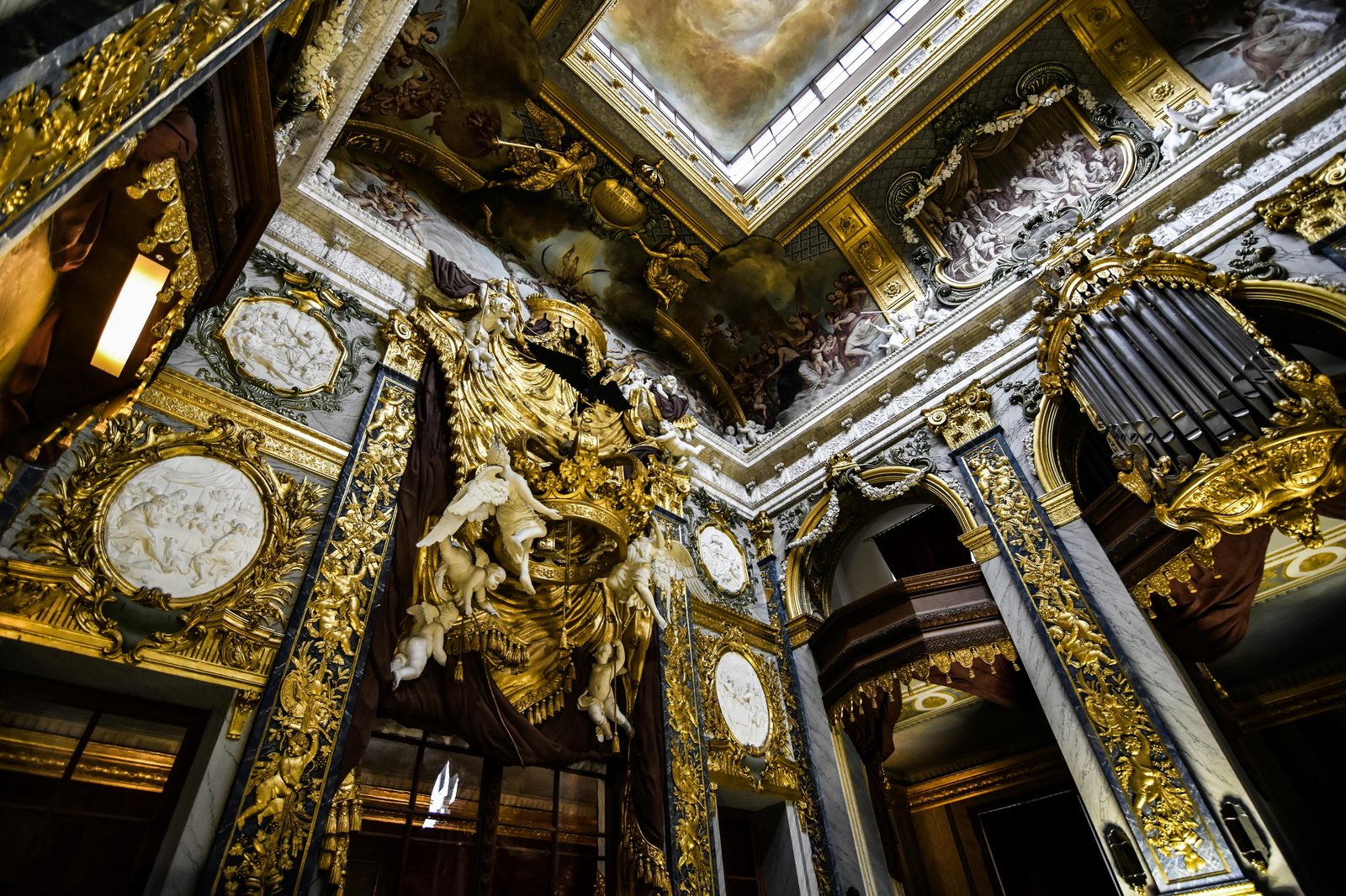 Intricate Baroque architecture with lavish gold details in a grand palace interior — Rosenborg's 24 royal rooms display Christian IV through Frederik VII