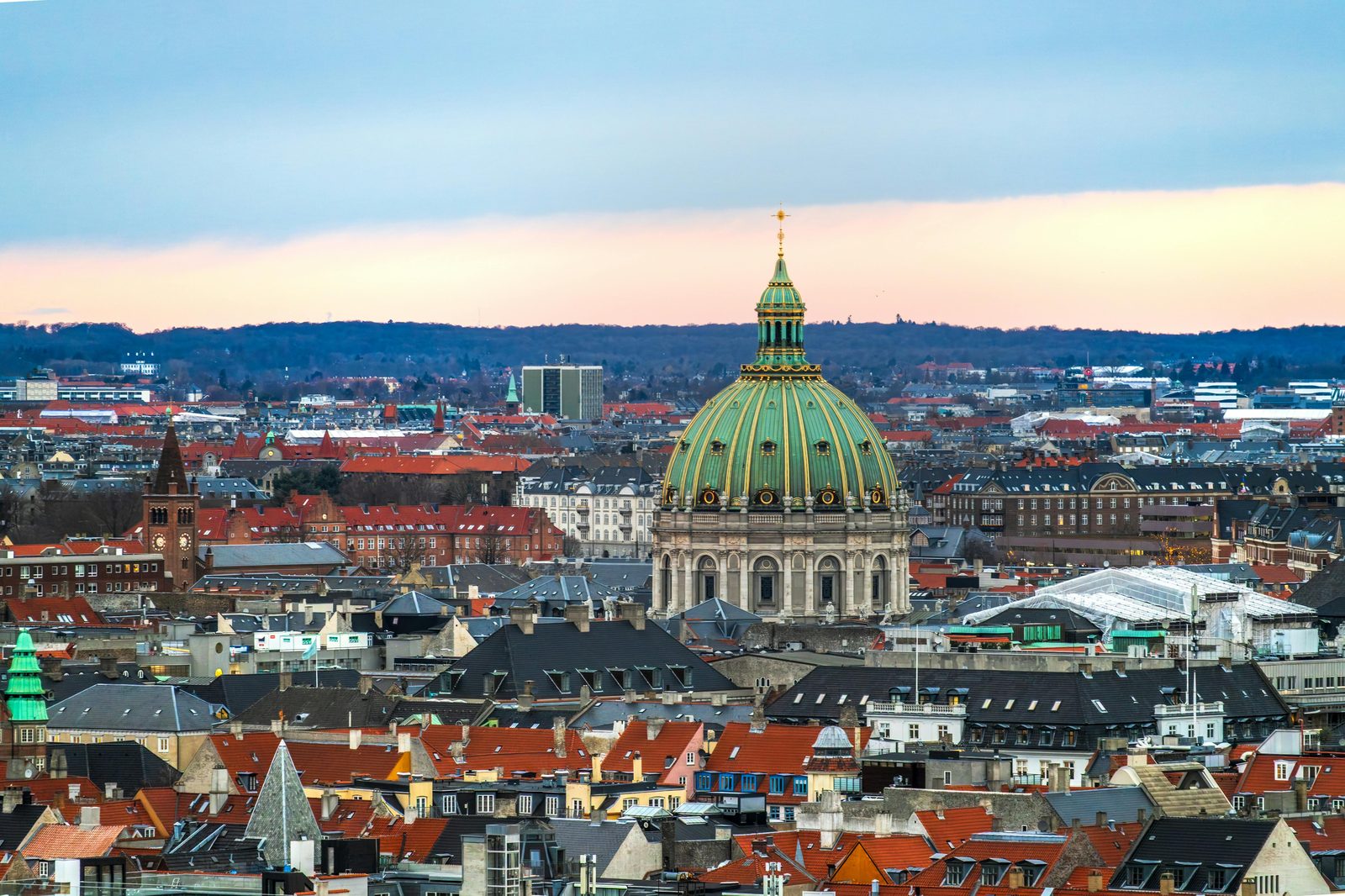 Stunning aerial view of Copenhagen's historical architecture and waterways — the Round Tower has been part of Copenhagen's skyline for 384 years