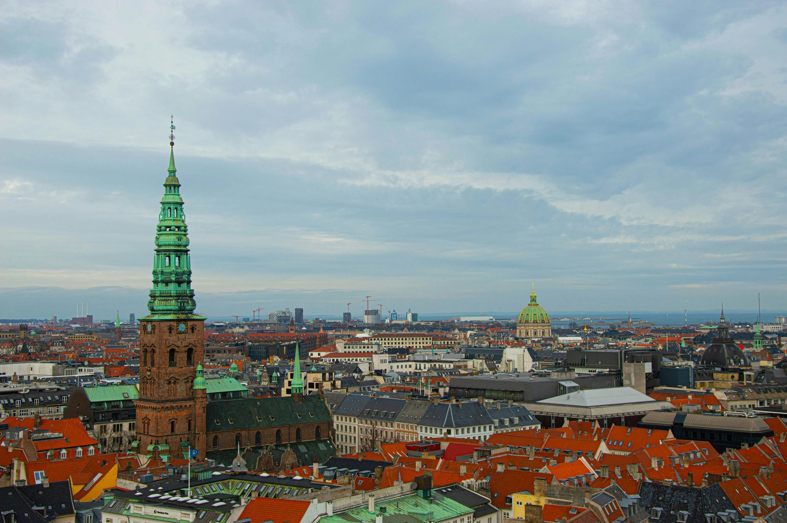 Stunning aerial view of Copenhagen showcasing historic architecture and urban landscape — the panoramic view from Round Tower's observation deck spans the entire Old City