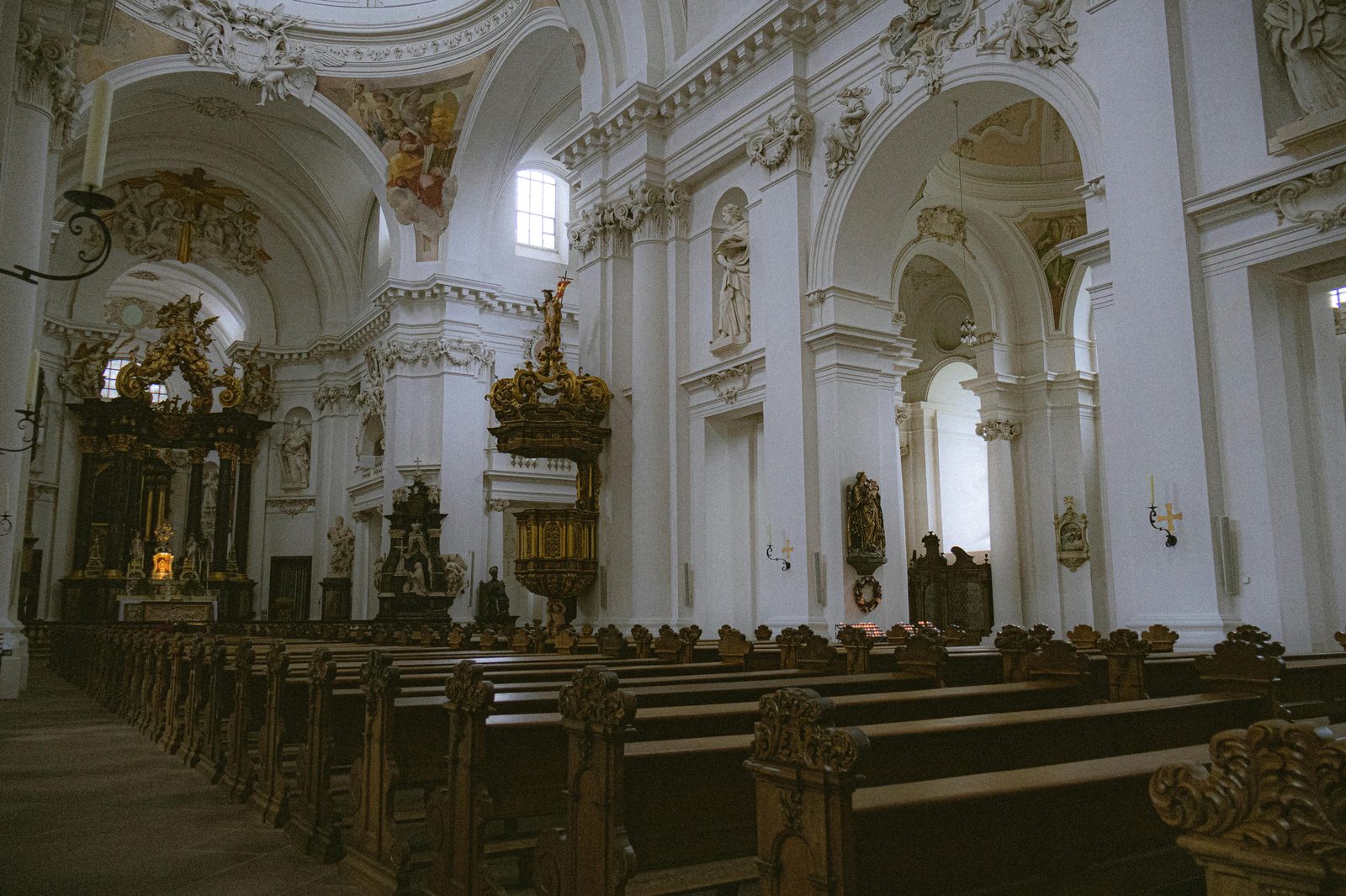 Captivating view of a baroque church interior with elegant architecture — Rundetaarn's tower forms part of the Trinitatis Church complex