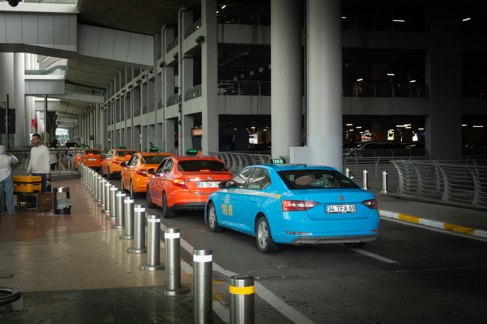 The taxi pickup zone at Copenhagen Airport — a fixed 300 DKK fare to most central destinations