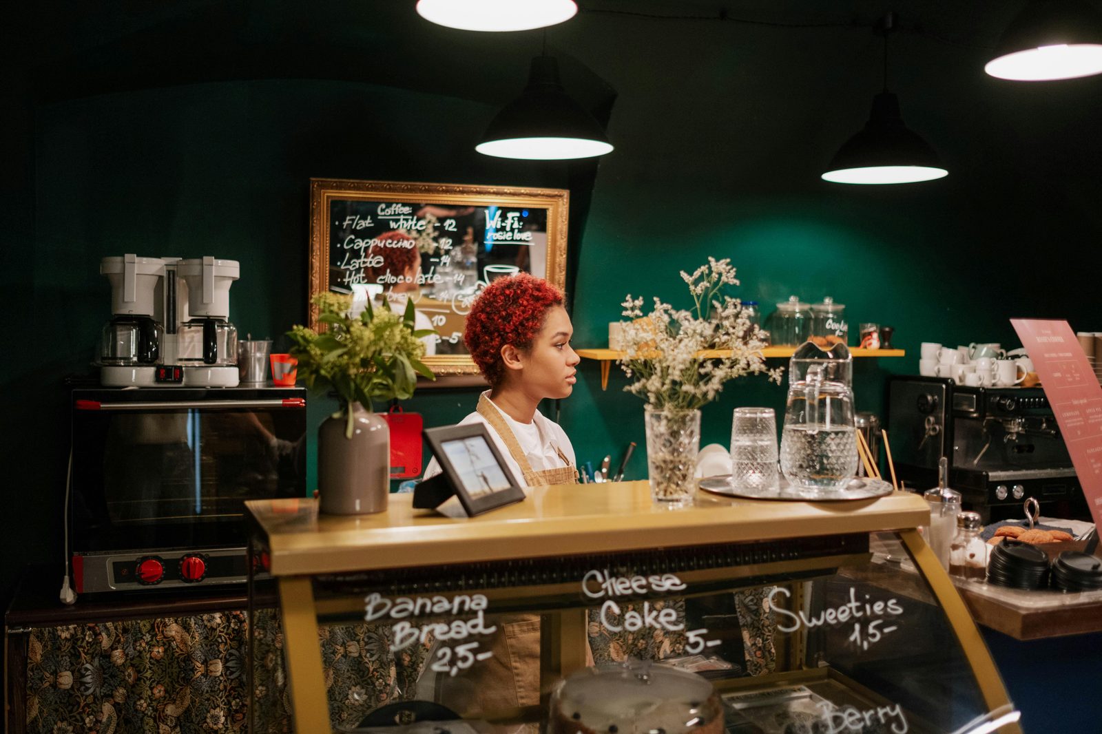 Small artisan bakery cafe interior — Copenhagen specialty bakeries like Lille Bakery emphasize tiny, focused production with limited daily output
