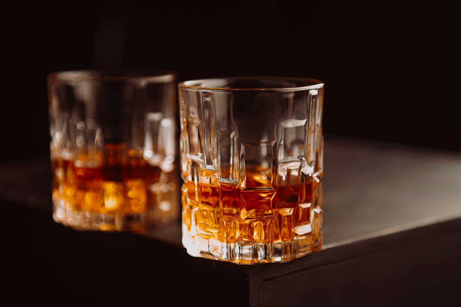 Aquavit traditional liquor glasses — Danish aquavit (snaps) is the classic smørrebrød accompaniment, especially with herring