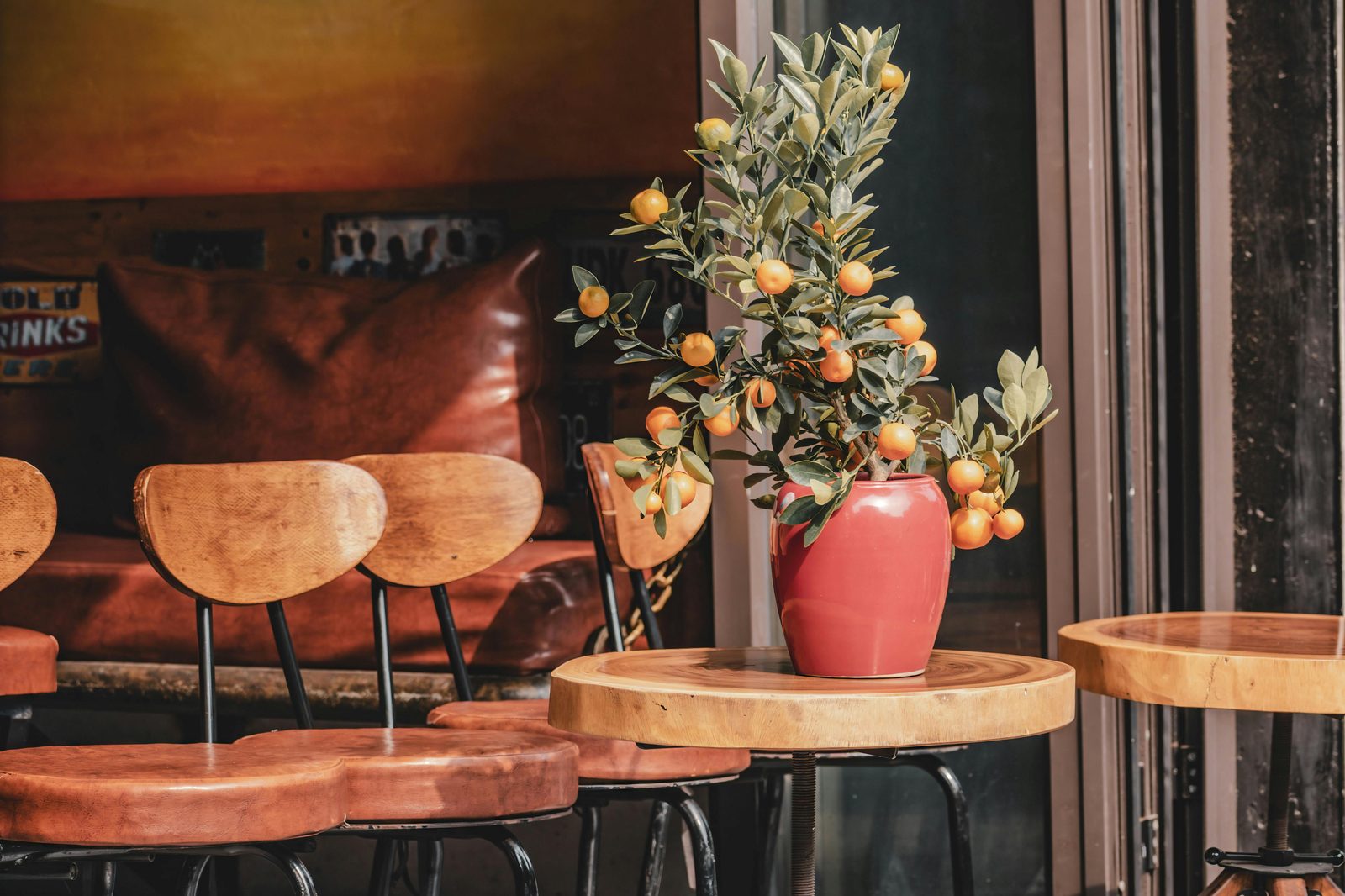 Cozy cafe interior autumn warm — Copenhagen hygge cafe season starts in October with warm interiors, candlelight, and seasonal menus
