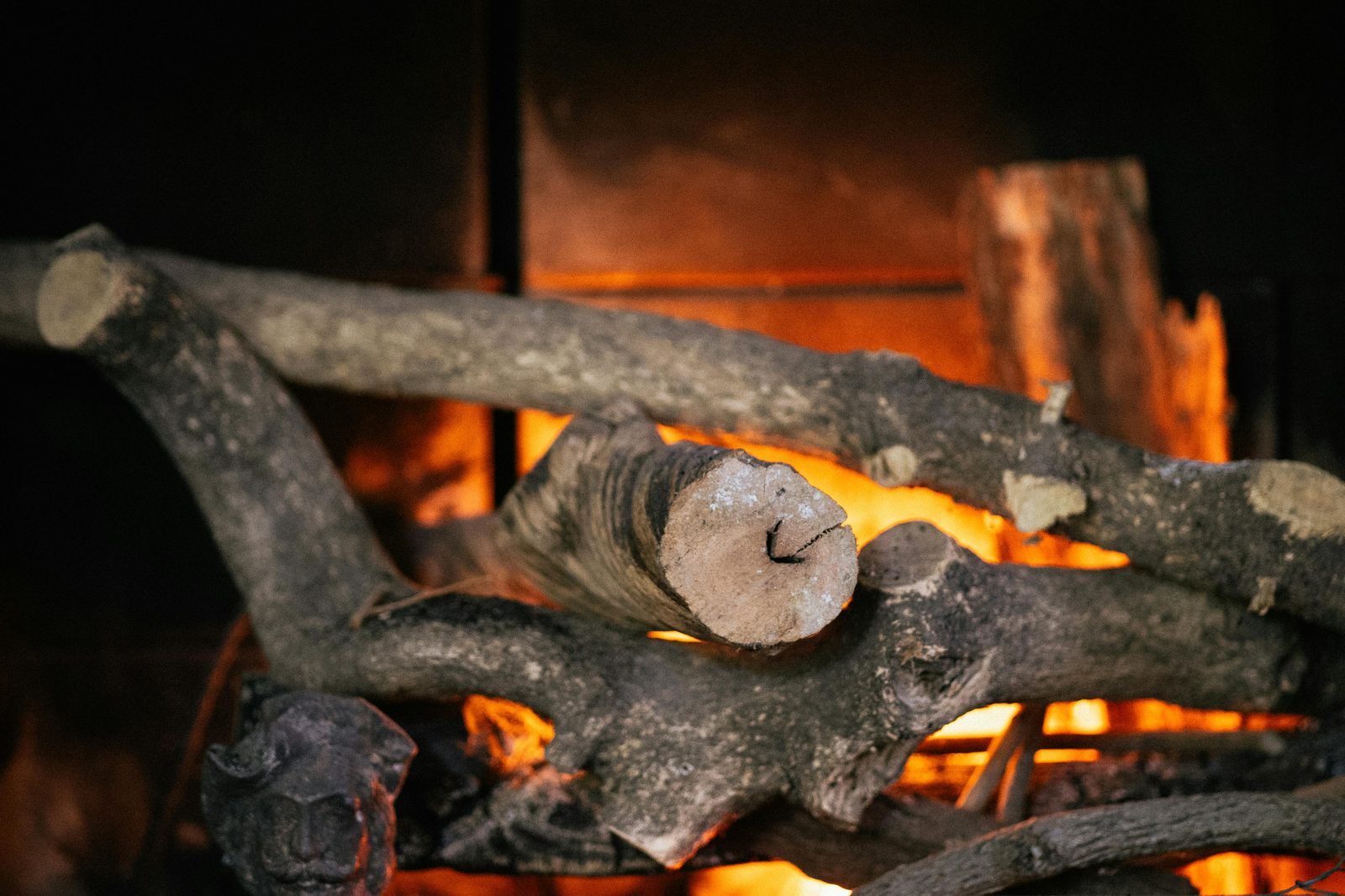 Cafe fireplace warm interior — Copenhagen winter cafes embrace hygge with fireplaces, candles, blankets, and seasonal Nordic comfort food