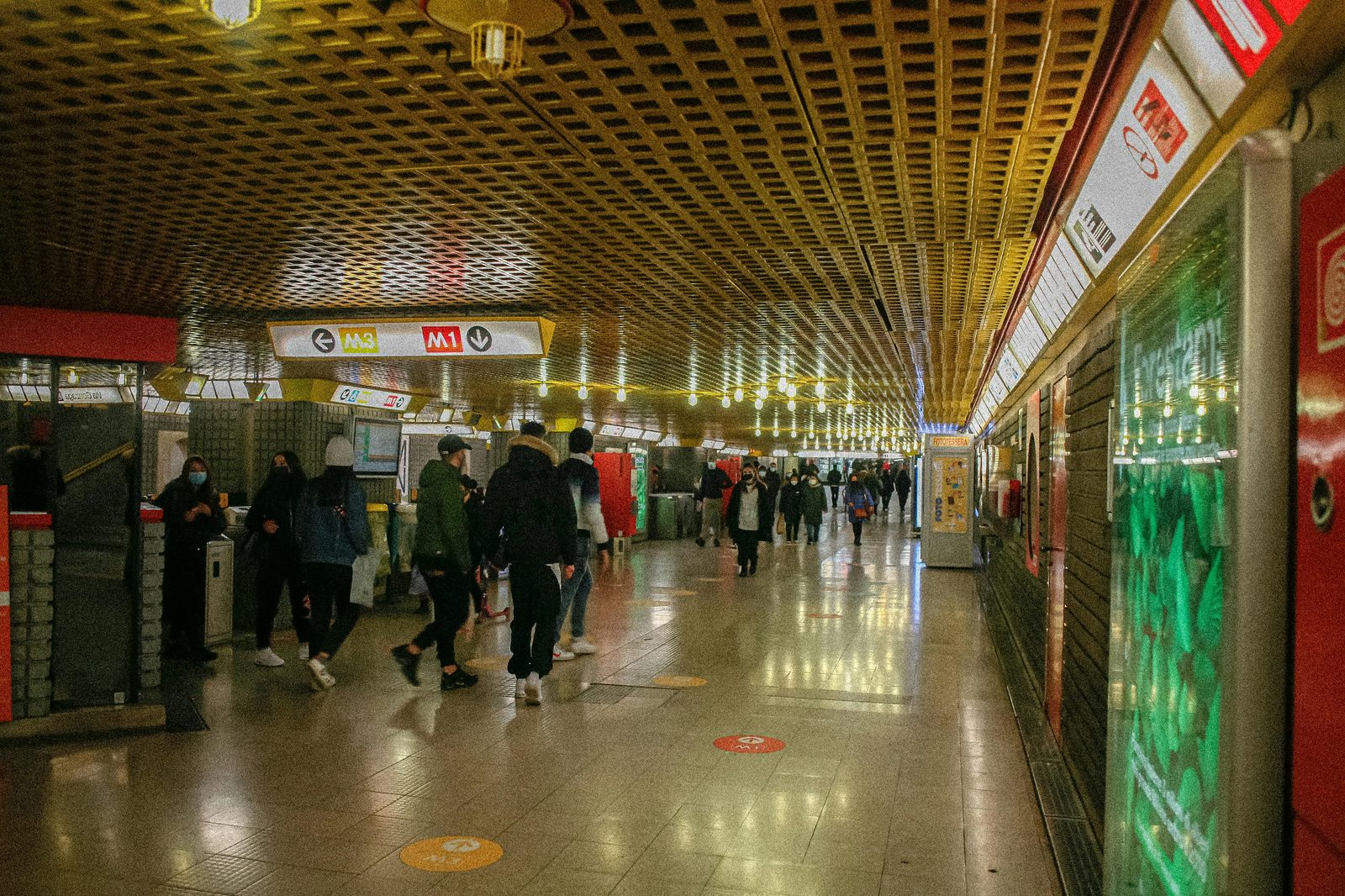 Metro station with platform doors — Copenhagen Metro stations have full-height platform screen doors for safety