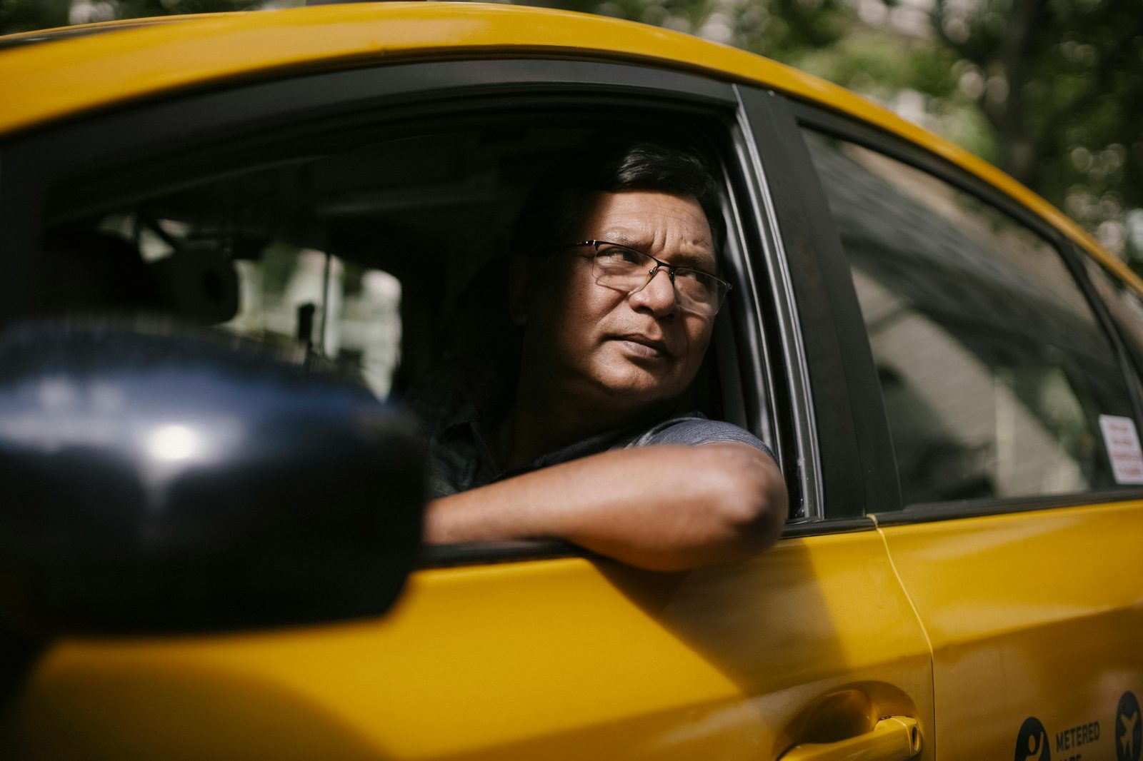 A licensed Copenhagen taxi driver — drivers speak English and every cab takes cards