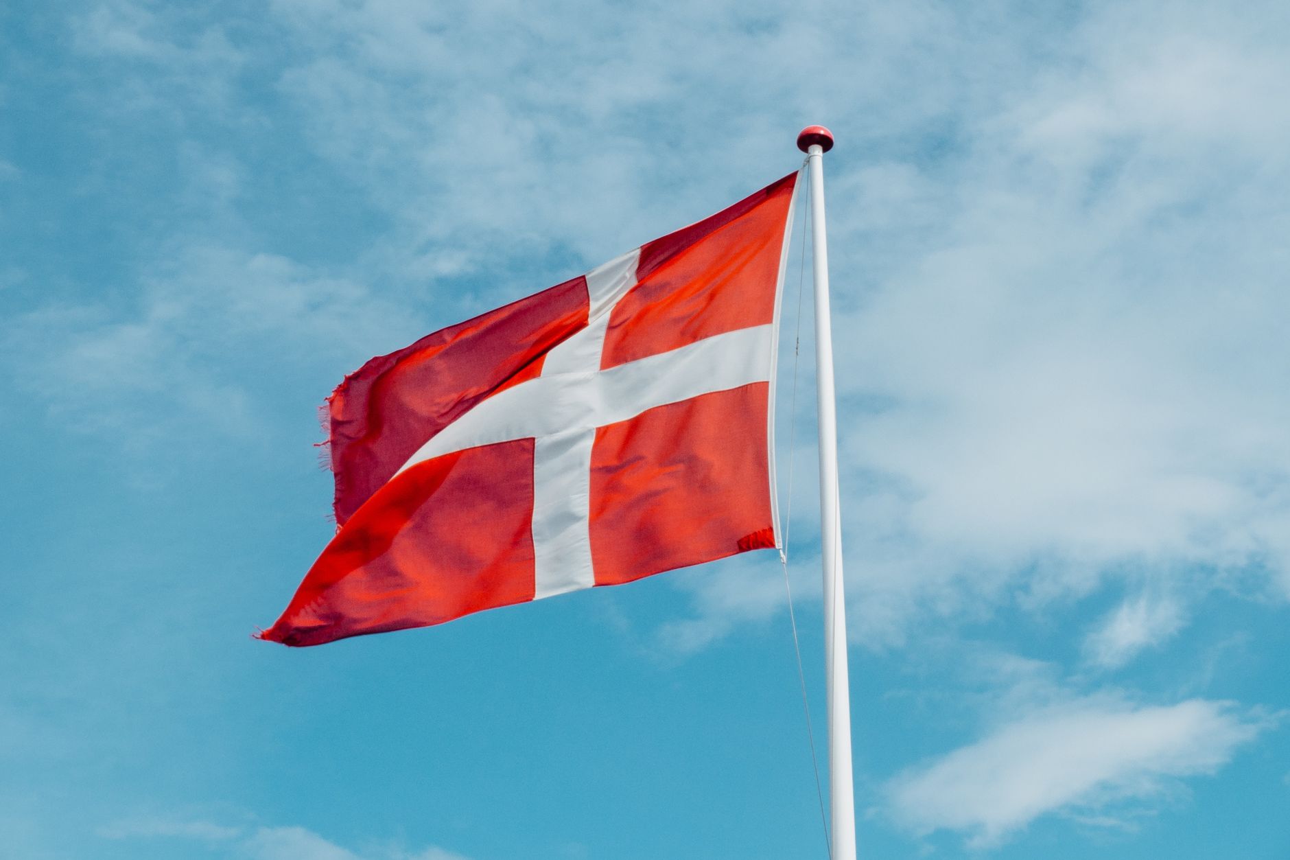 The Danish flag — Danish is the official language