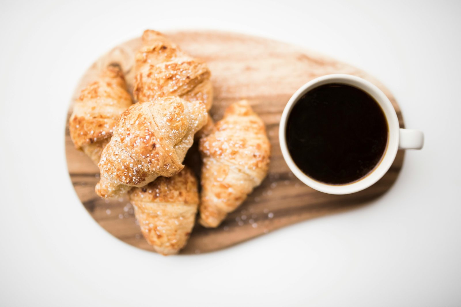 Coffee with pastry breakfast — Danish pastries pair traditionally with strong filter coffee or specialty espresso