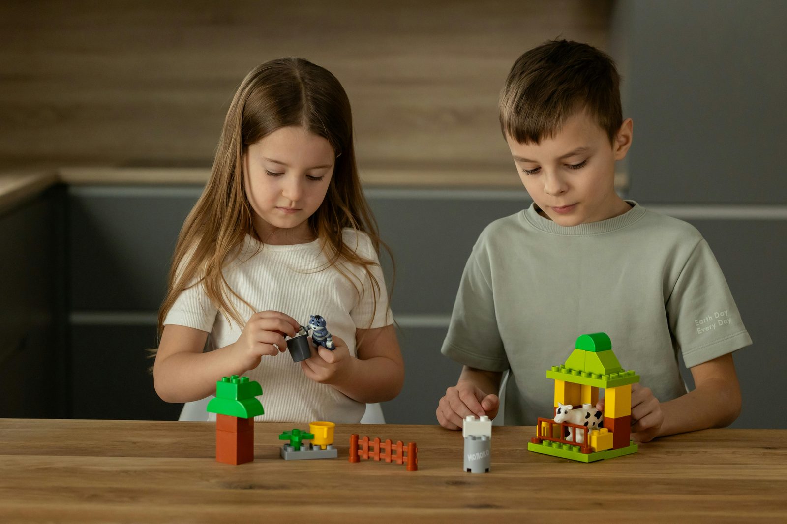 Children building at the interactive Lego House in Billund