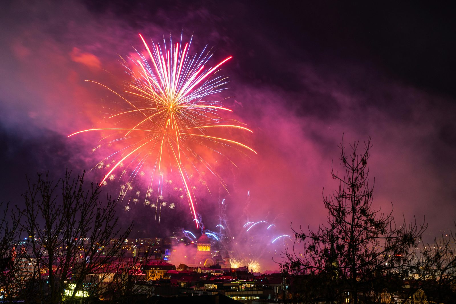 New year eve fireworks city — Copenhagen New Year's Eve features citywide fireworks at midnight with major displays at Town Hall Square