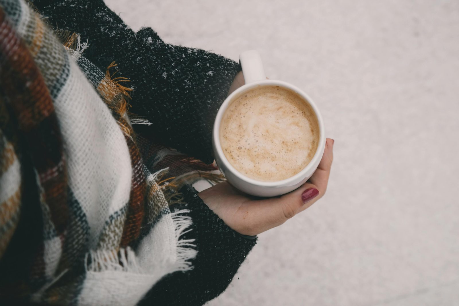 Hot drink cold weather hands — Copenhagen December warm-up culture includes glogg, hot chocolate, and Hot Liquor at hygge cafes