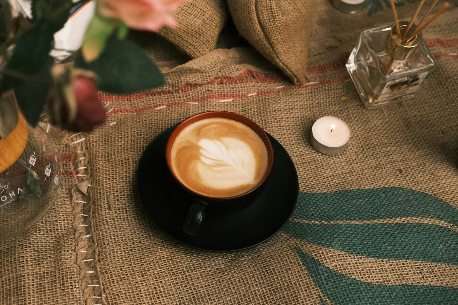 Warm coffee cafe candles winter — best Copenhagen hygge cafes include Cafe Wilder, Hart Bageri, Atelier September