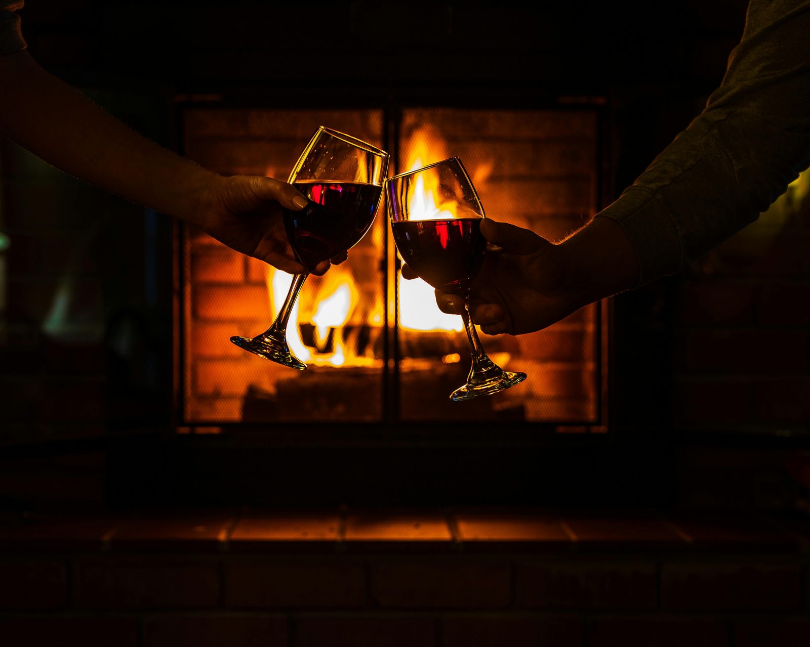 Fireplace cozy living room evening — Copenhagen winter homes often feature fireplaces as the hygge centerpiece