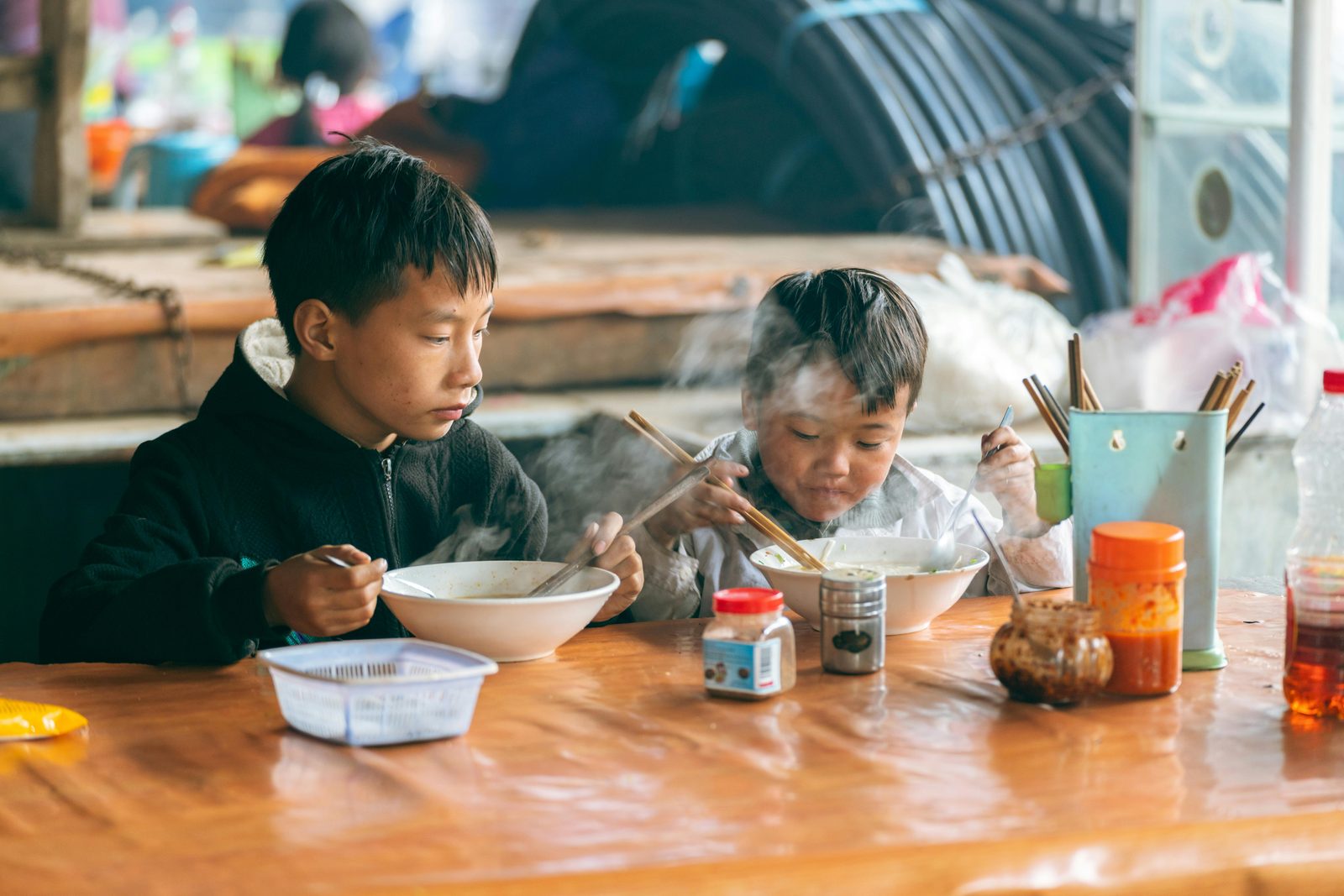 Families at the outdoor Reffen street food market in Copenhagen