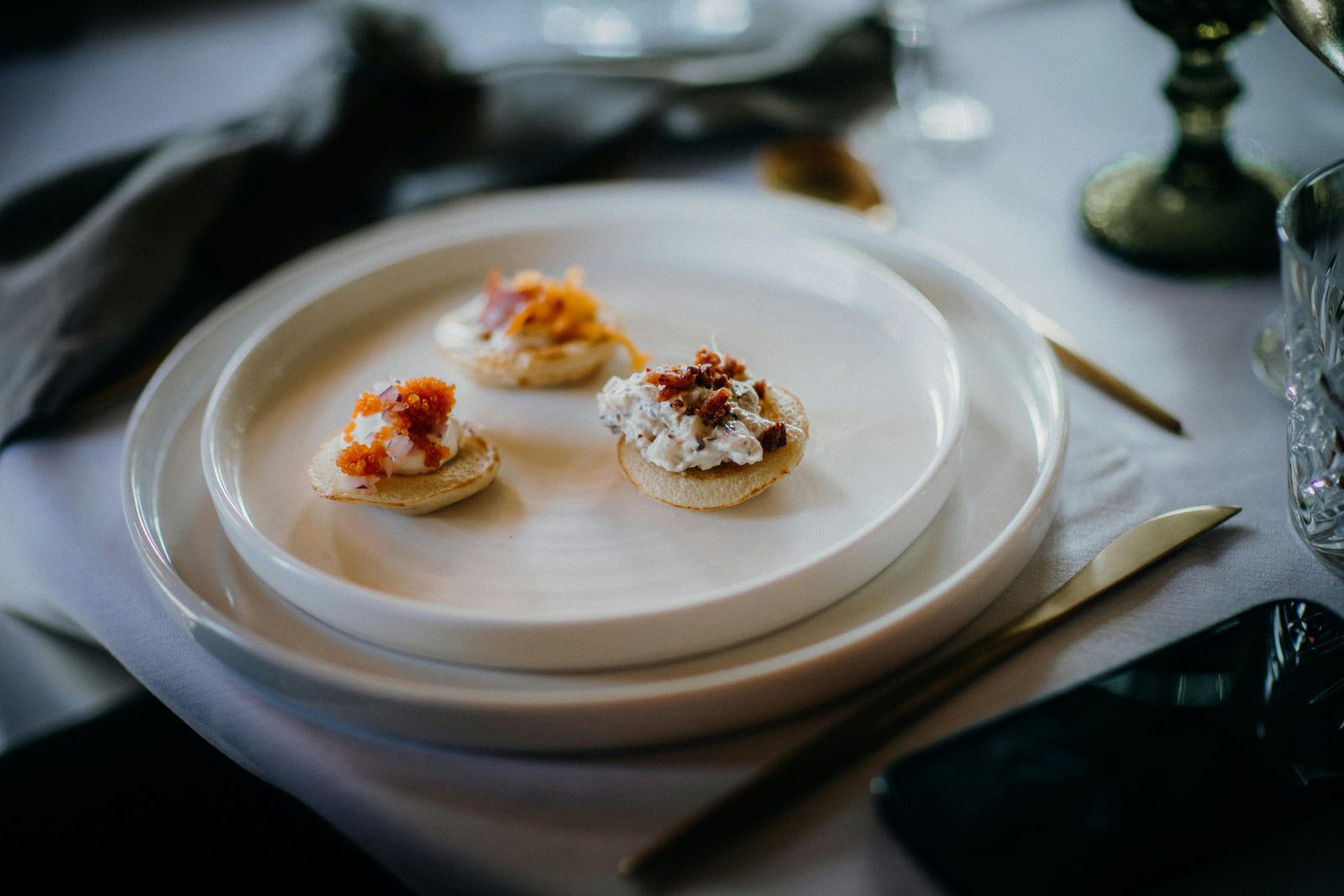 Amuse bouche with small-bite plating — Copenhagen Michelin tasting menus typically open with 3–5 amuse bouches before the formal courses