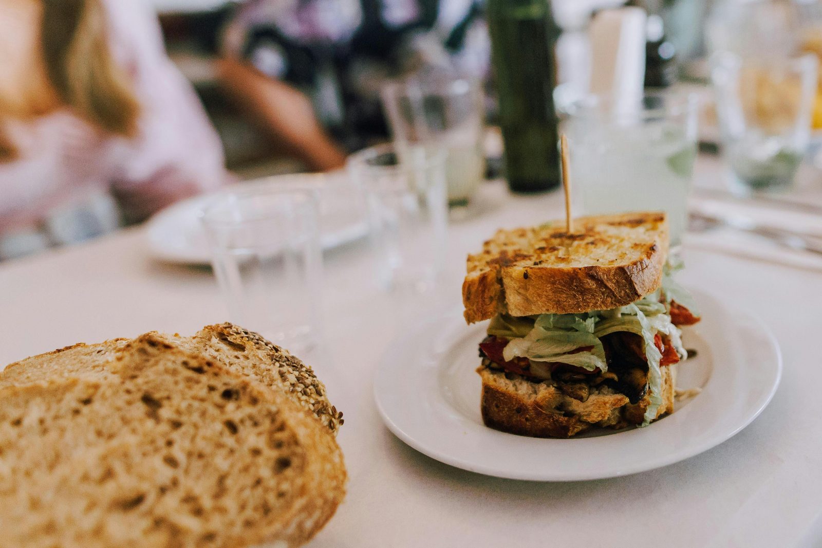 Open sandwich lunch table — smorrebrod (Danish open sandwich) is the perfect Copenhagen 1 day itinerary lunch