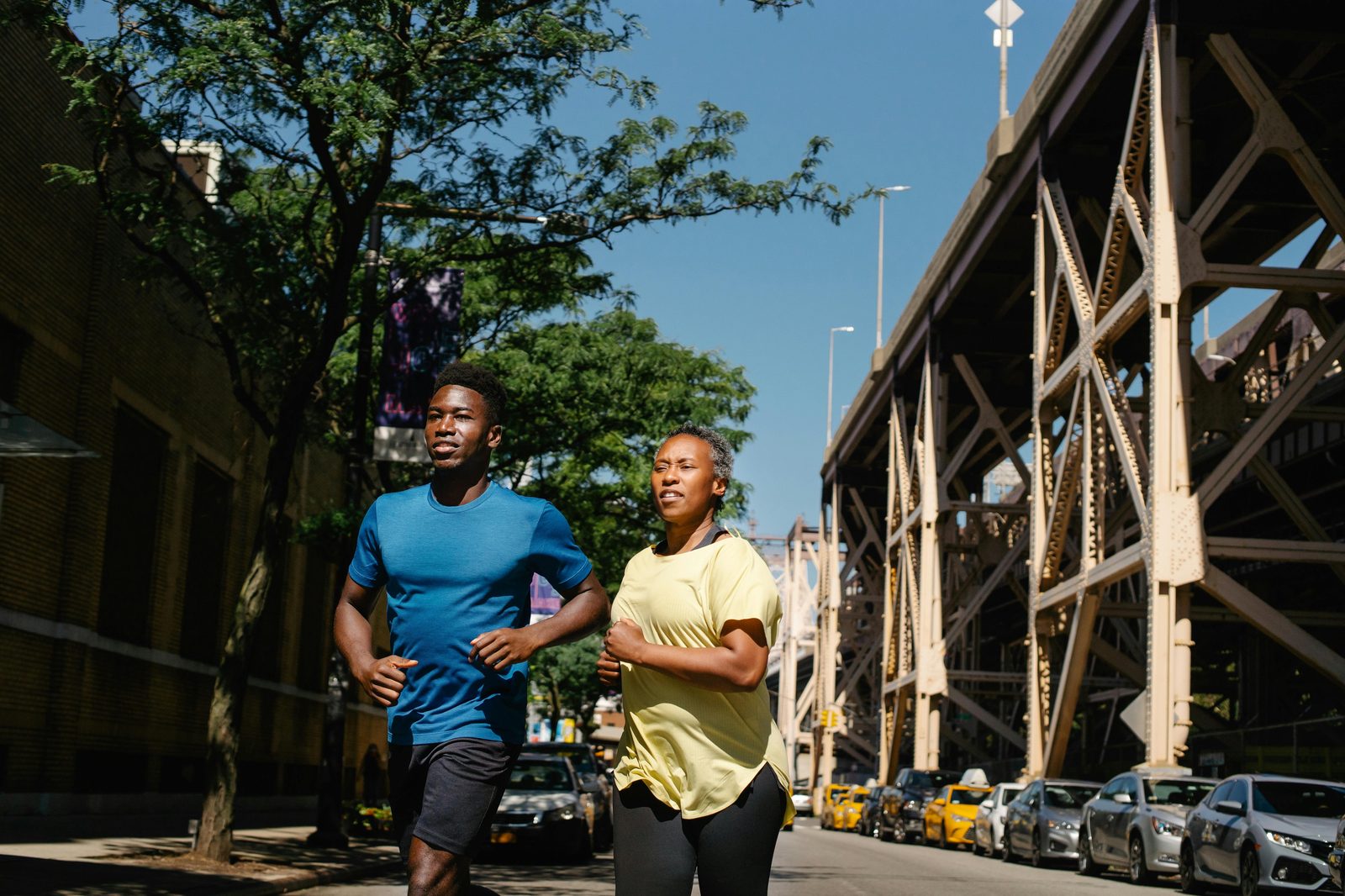 People running in city park — Osterbro residents are Copenhagen's most-active, with running circuits at Faelledparken and the Lakes