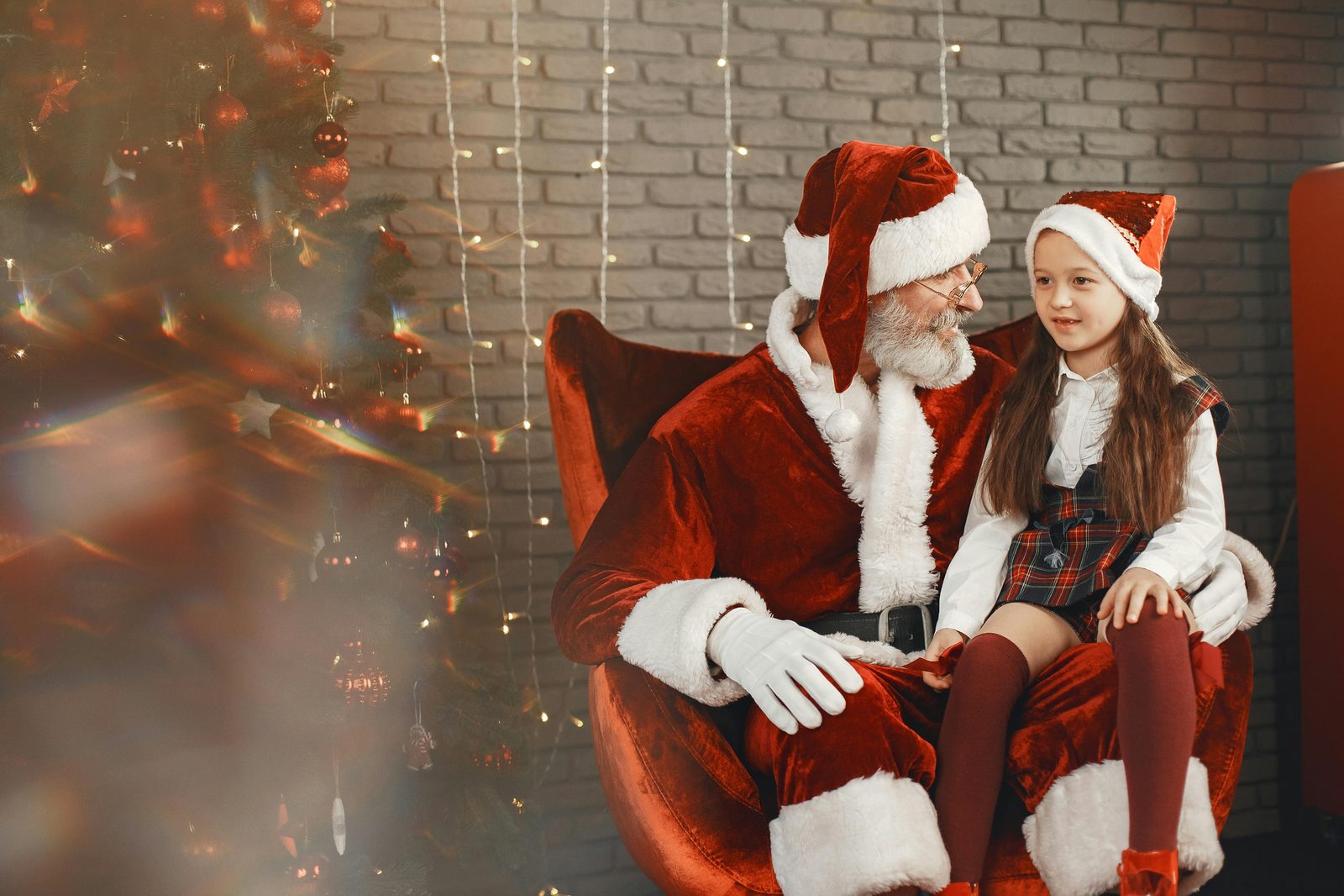 Children meeting Santa at the Royal Christmas section of Tivoli in Copenhagen