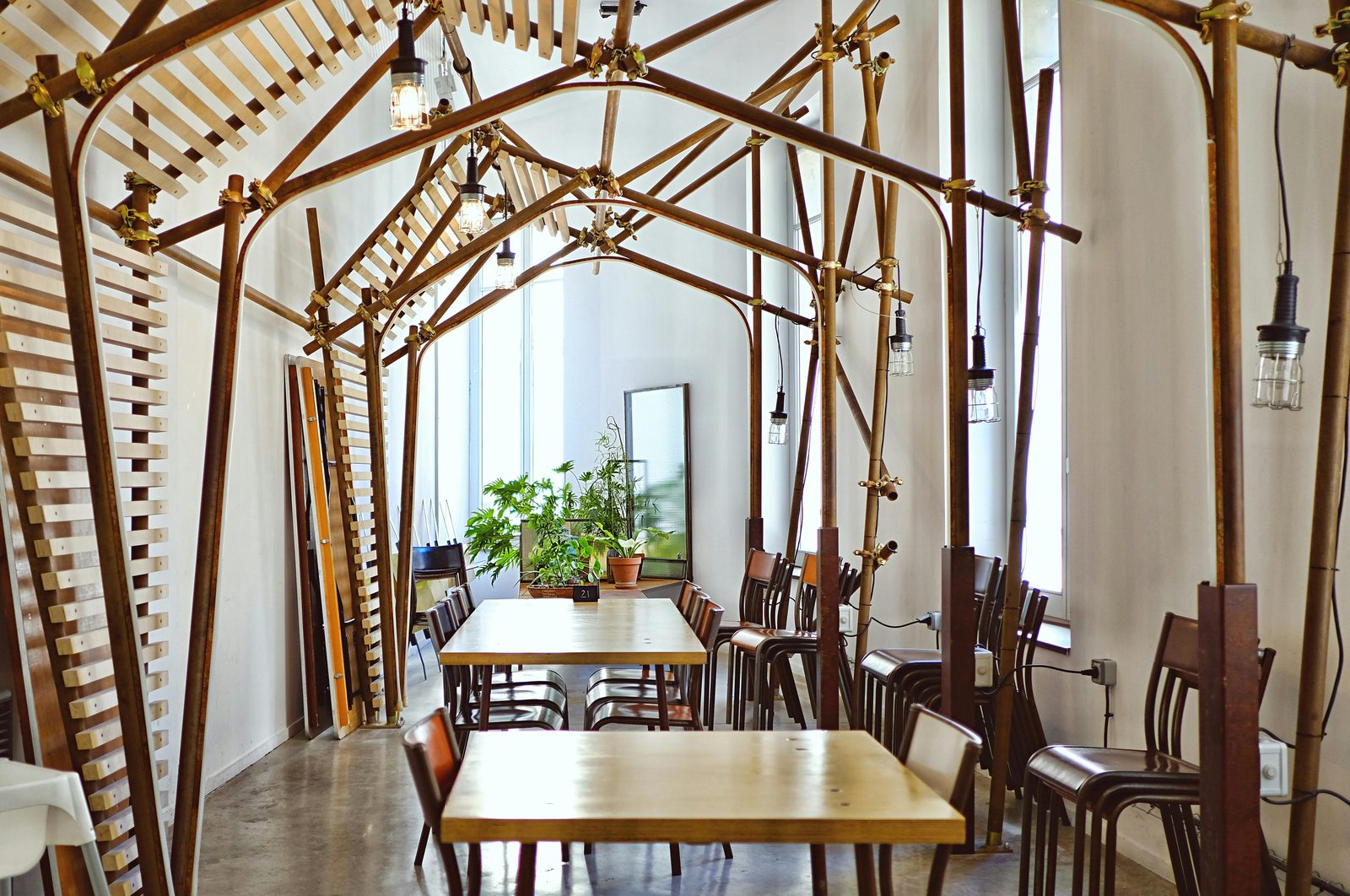 Scandinavian vegan restaurant interior — Copenhagen vegan restaurants embrace minimalist Nordic design with raw materials and natural light