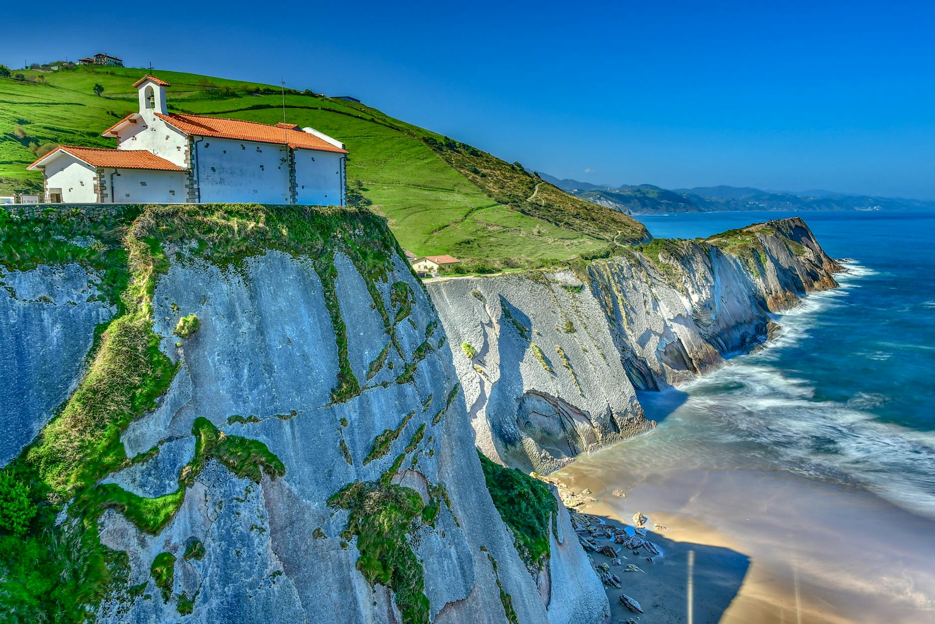 Hojerup old church perched on the Stevns Klint cliff edge