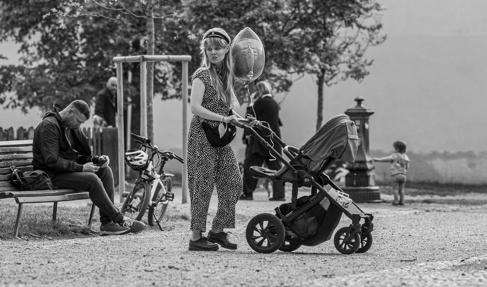 A pram parked beside a family-friendly Copenhagen cafe table