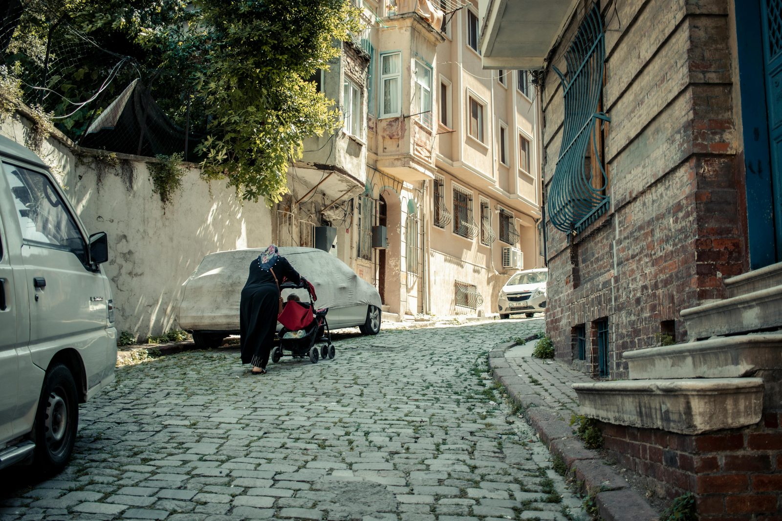 A stroller on the cobbled streets of old central Copenhagen