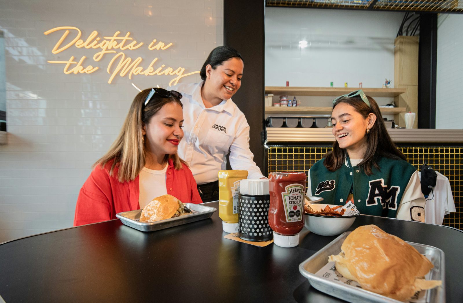 Teenagers eating burgers at a casual Copenhagen restaurant