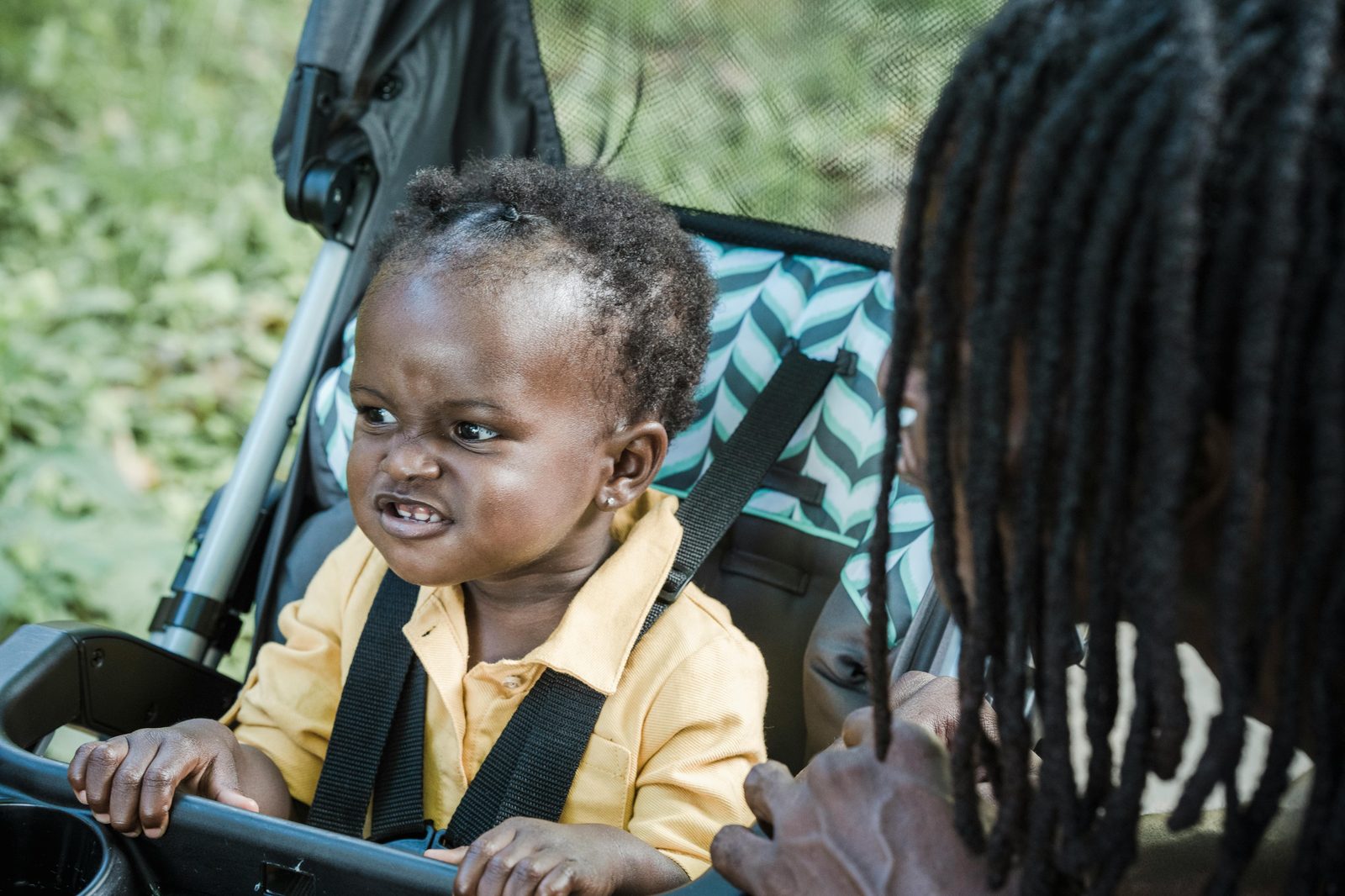 Family with a stroller on Tivoli's wide accessible pathways