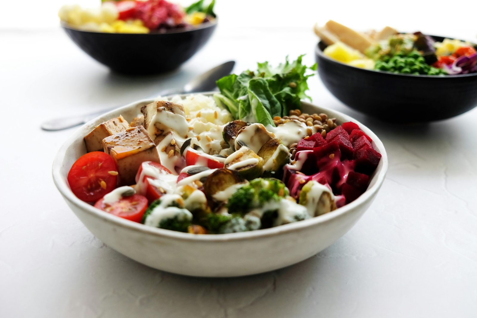 Colorful vegan buddha bowl — many Copenhagen vegan restaurants center on grain bowls with seasonal Nordic vegetables