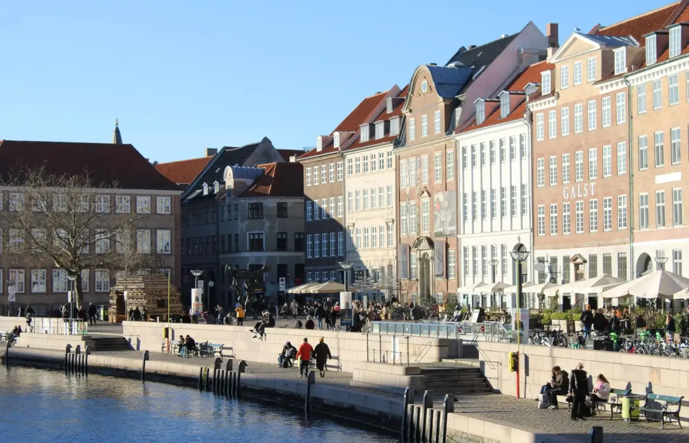 People out on the Copenhagen waterfront on a bright, cold winter day