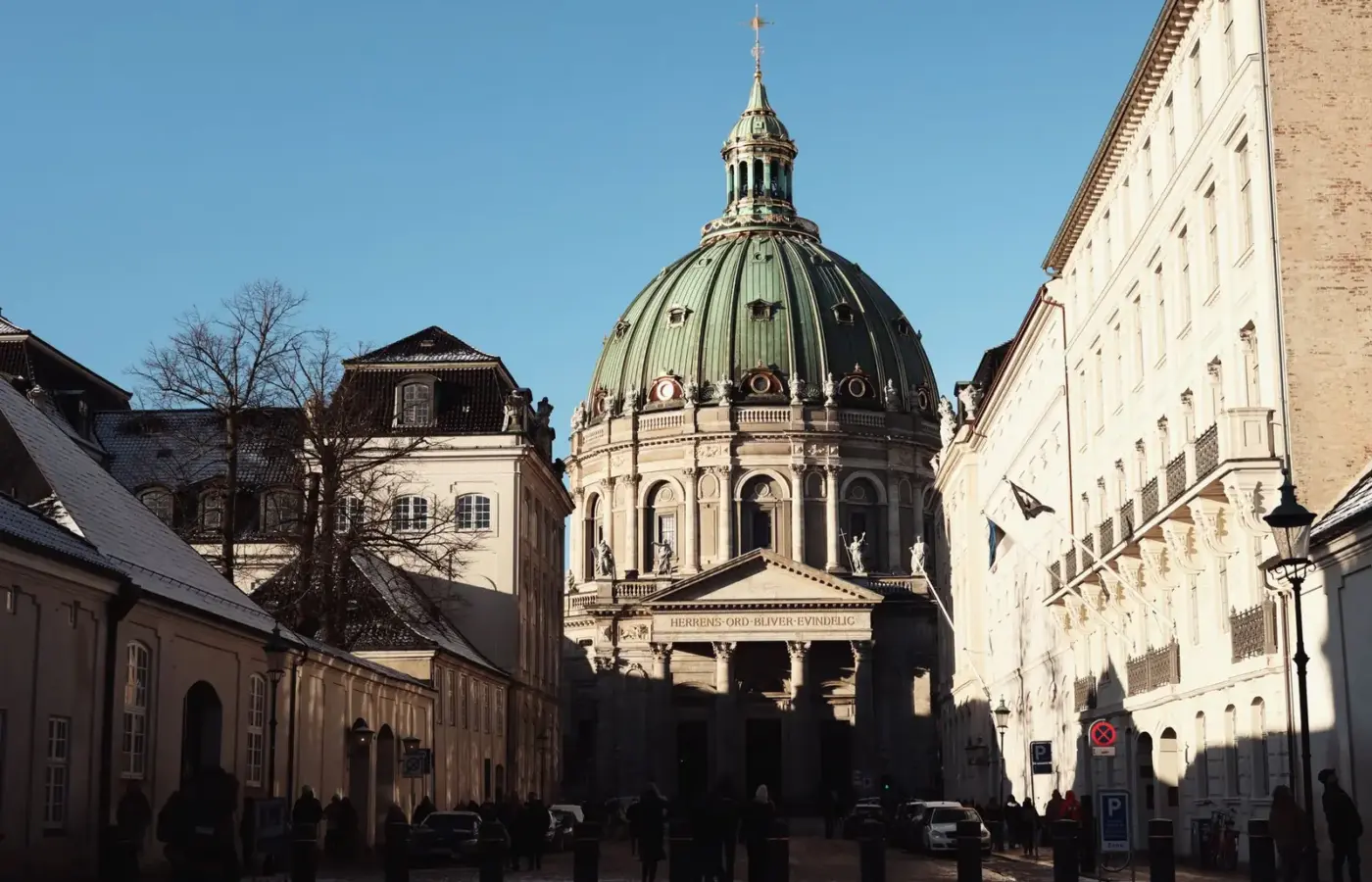 The copper dome of the Marble Church in Copenhagen under a clear winter sky
