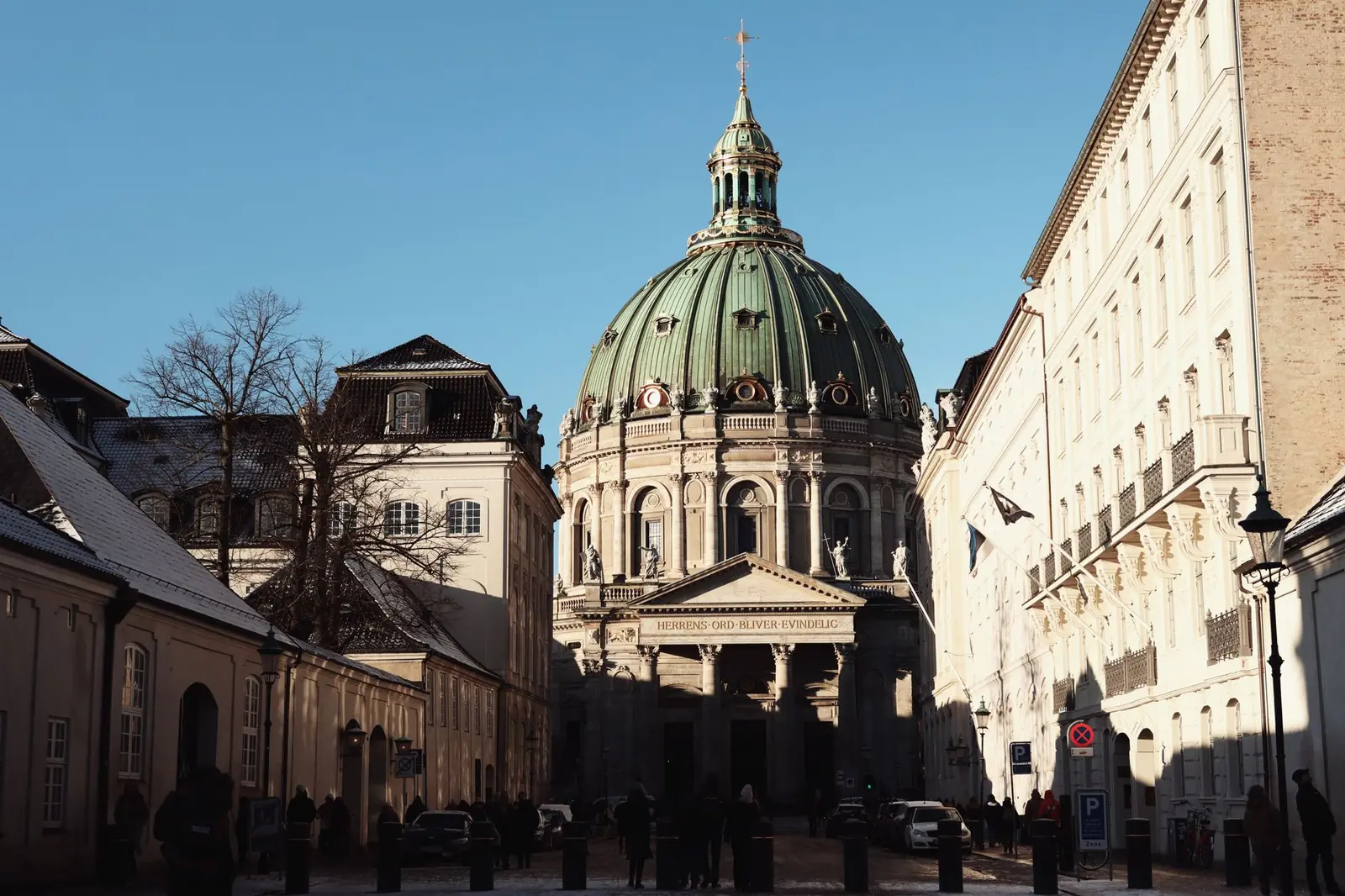 The copper dome of the Marble Church in Copenhagen under a clear winter sky