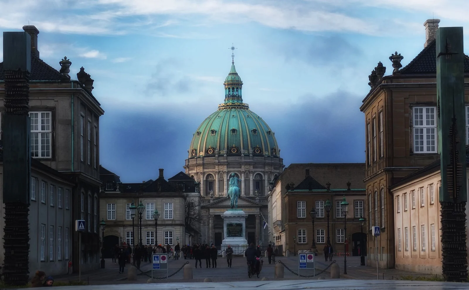 The Marble Church dome at dusk, seen between the palace buildings of Amalienborg