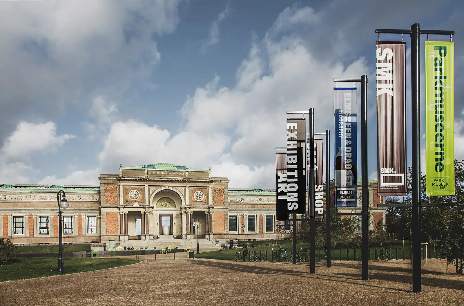 Exhibition banners on poles in front of the SMK main entrance