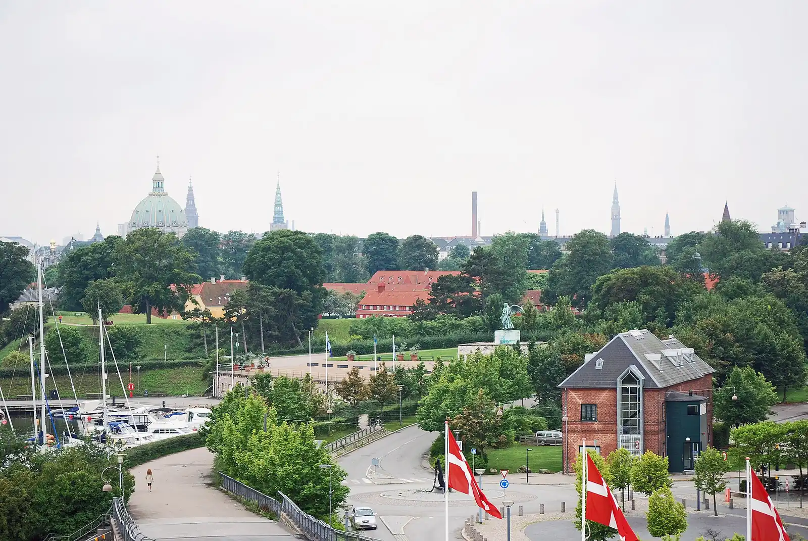 The view from a cruise ship at Langelinie over the marina, Kastellet's red barracks and the dome of the Marble Church