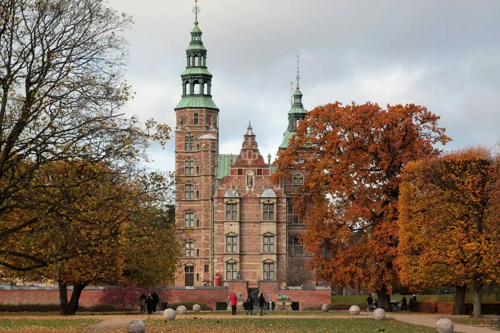 Rosenborg Castle seen across Kongens Have with the trees in autumn colours