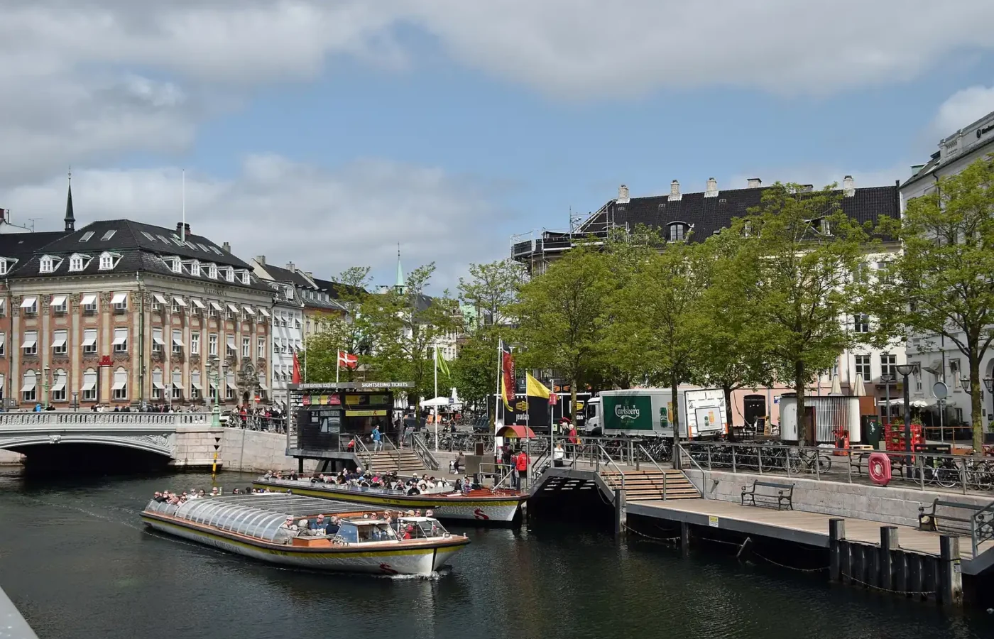 Canal tour boats moored along the Ved Stranden quay in central Copenhagen